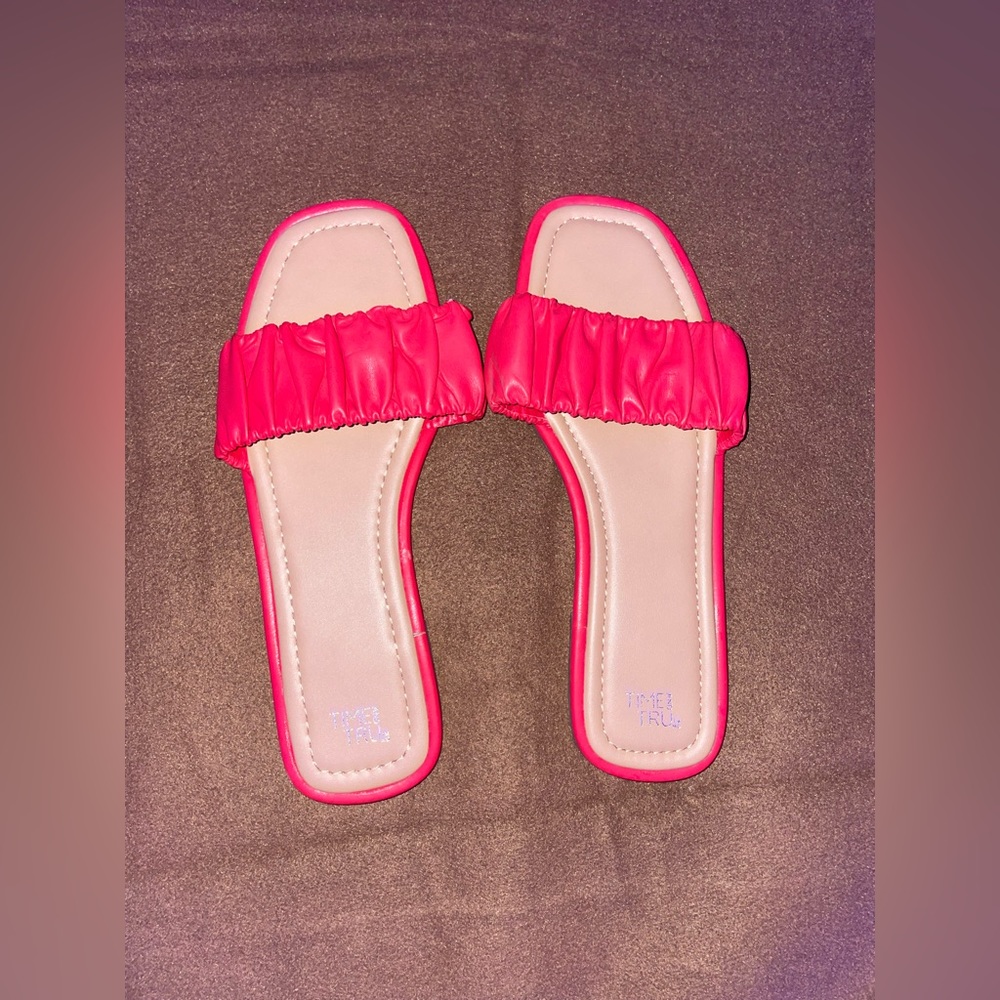 Pair of red leather slippers